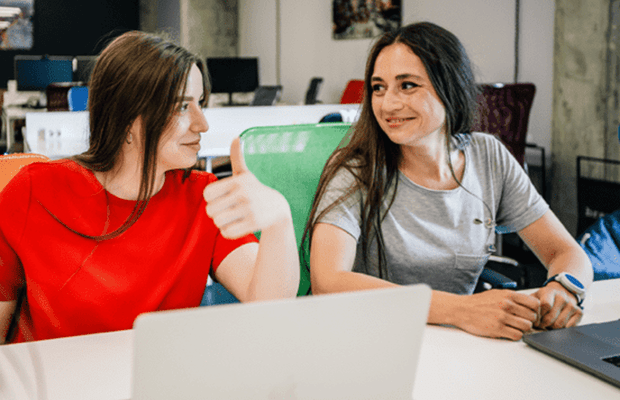Two colleagues looking at each other