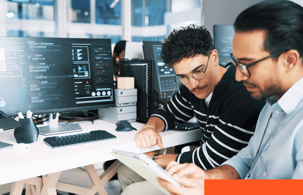 Software developers reviewing a cloud integration project