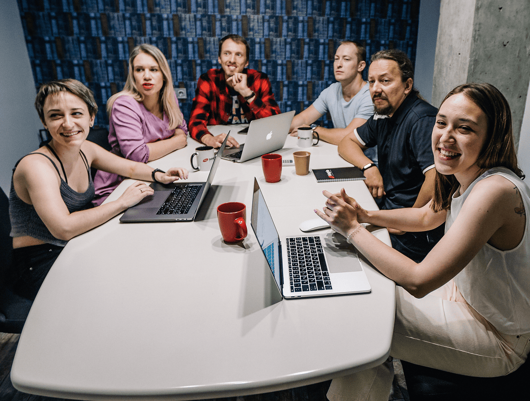 Colleagues working together on AI agent integration