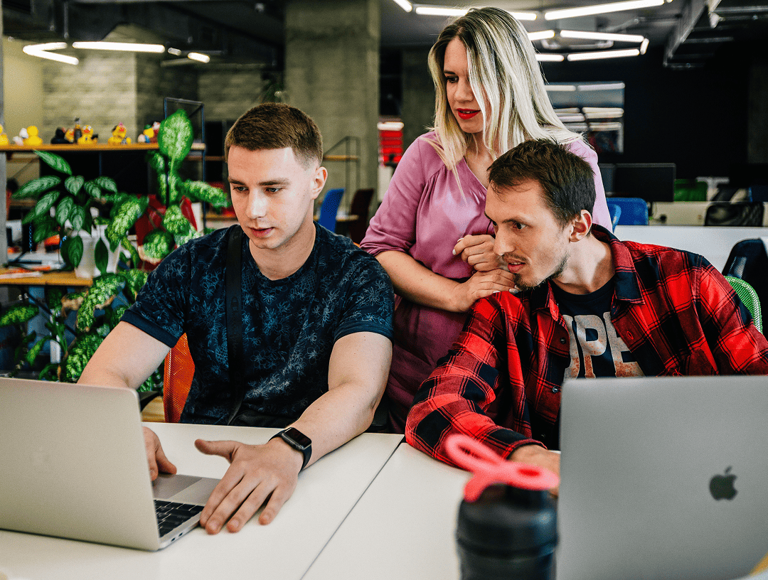 Colleagues working together on AI data source integration
