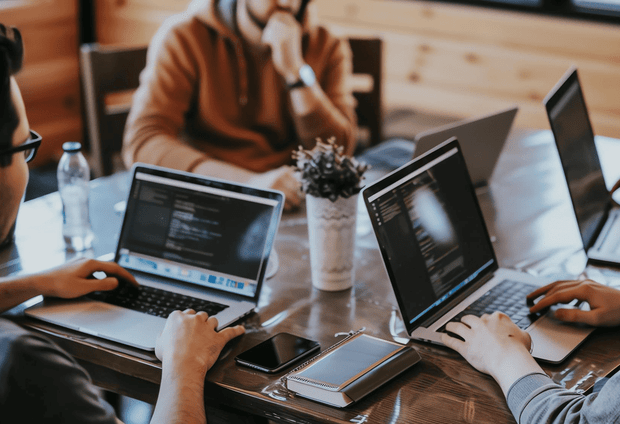 AI engineers collaborating on AI agent development