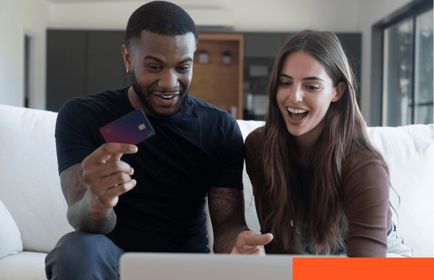 Customers using a payment card while reviewing a purchase online