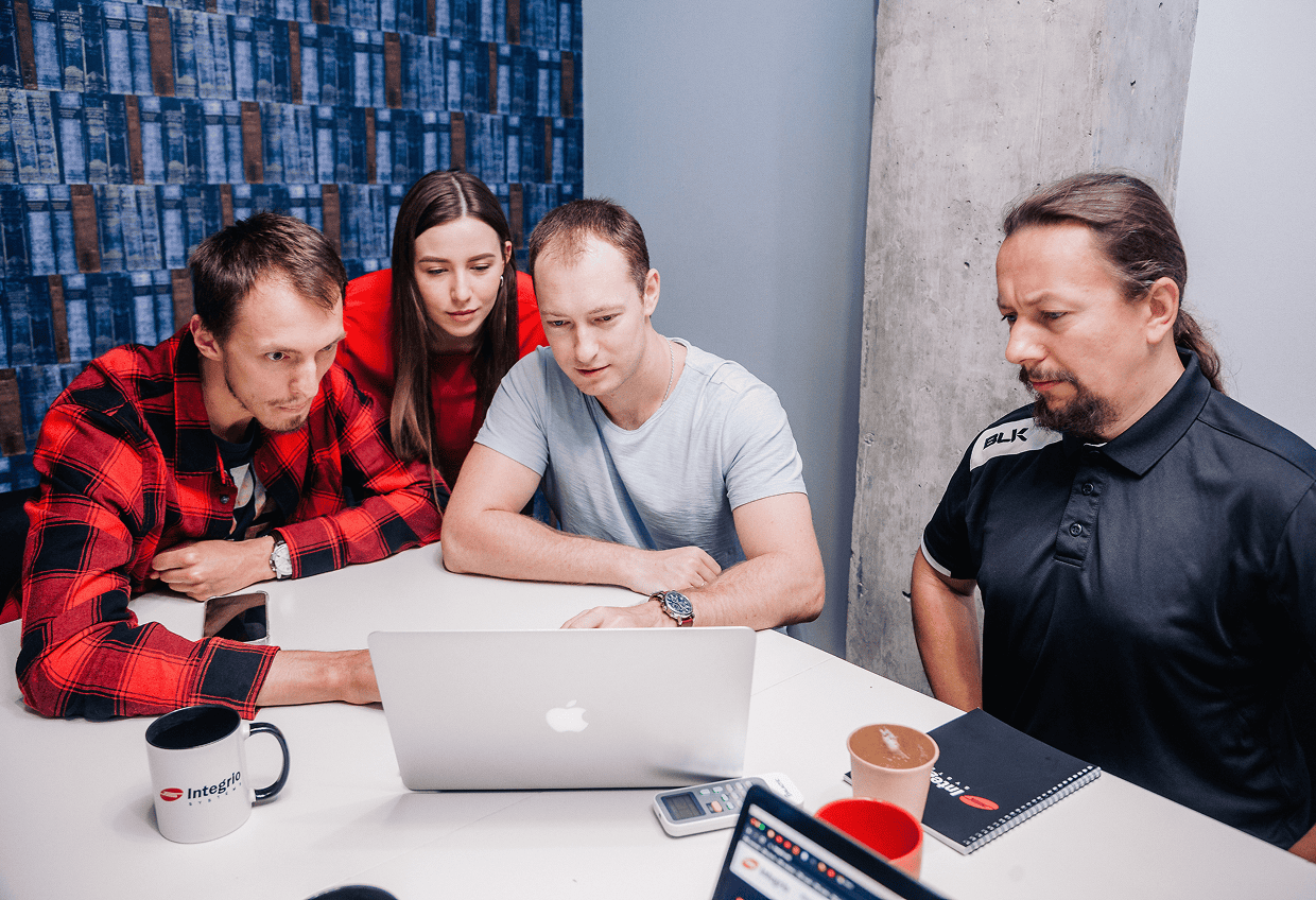 Cloud Application Development Team. Cloud development team collaborating in the office.