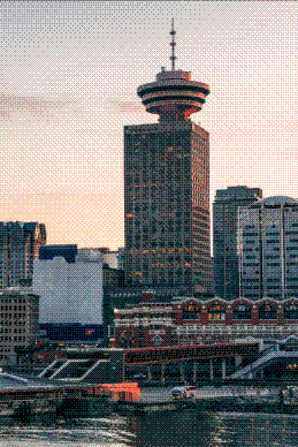 Vancouver Lookout tower and the waterfront buildings at dusk