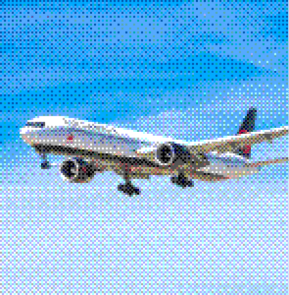 Passenger airplane flying in a clear blue sky