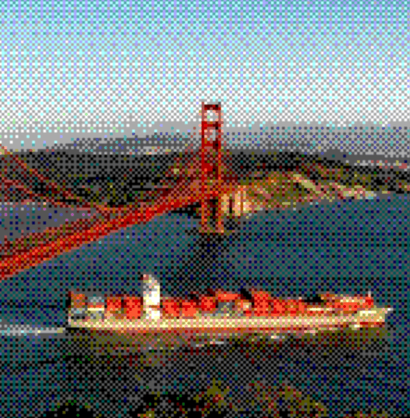 Cargo ship sailing under a suspension bridge