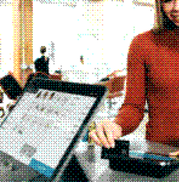 Retail employee using a tablet point-of-sale system