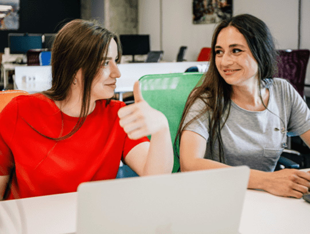 Two colleagues working together on LLM integration